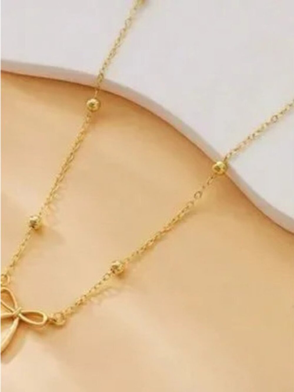 Gold Stainless Steel Bow Beaded Pendant Necklace - Picture 2 of 3
